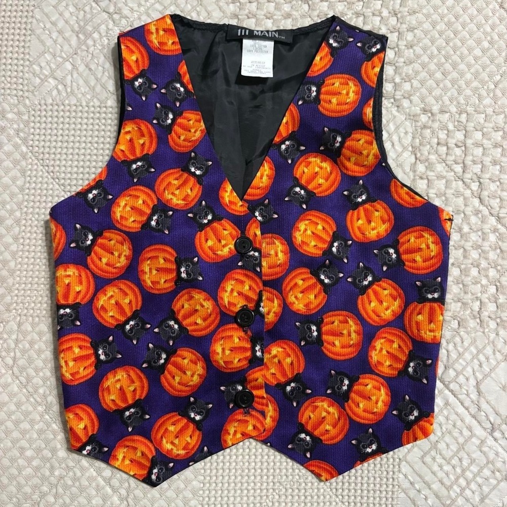 Vintage 90s Halloween vest with orange jack-o'-lanterns and black cats